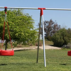 An image of a swing set with 2 red tire swings attached.