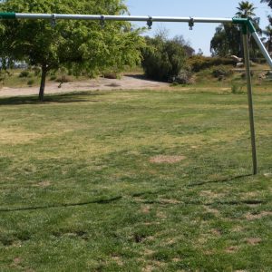 An image of a swing set.