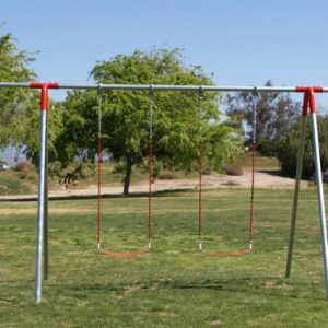 An image of a swing set with 4 red swing seats attached.