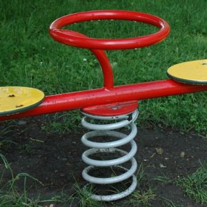 An image of a "teeter-totter" type spring rider.